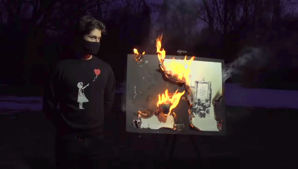 This authentic print by Banksy turned out to go up in value after the physical art was burned and replaced by an NFT of a digital copy. Source: YouTube