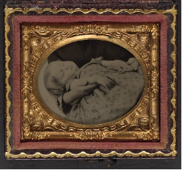 This 19th-century tintype of an unidentified child is among the earliest known post-mortem photographs. Source: Library of Congress